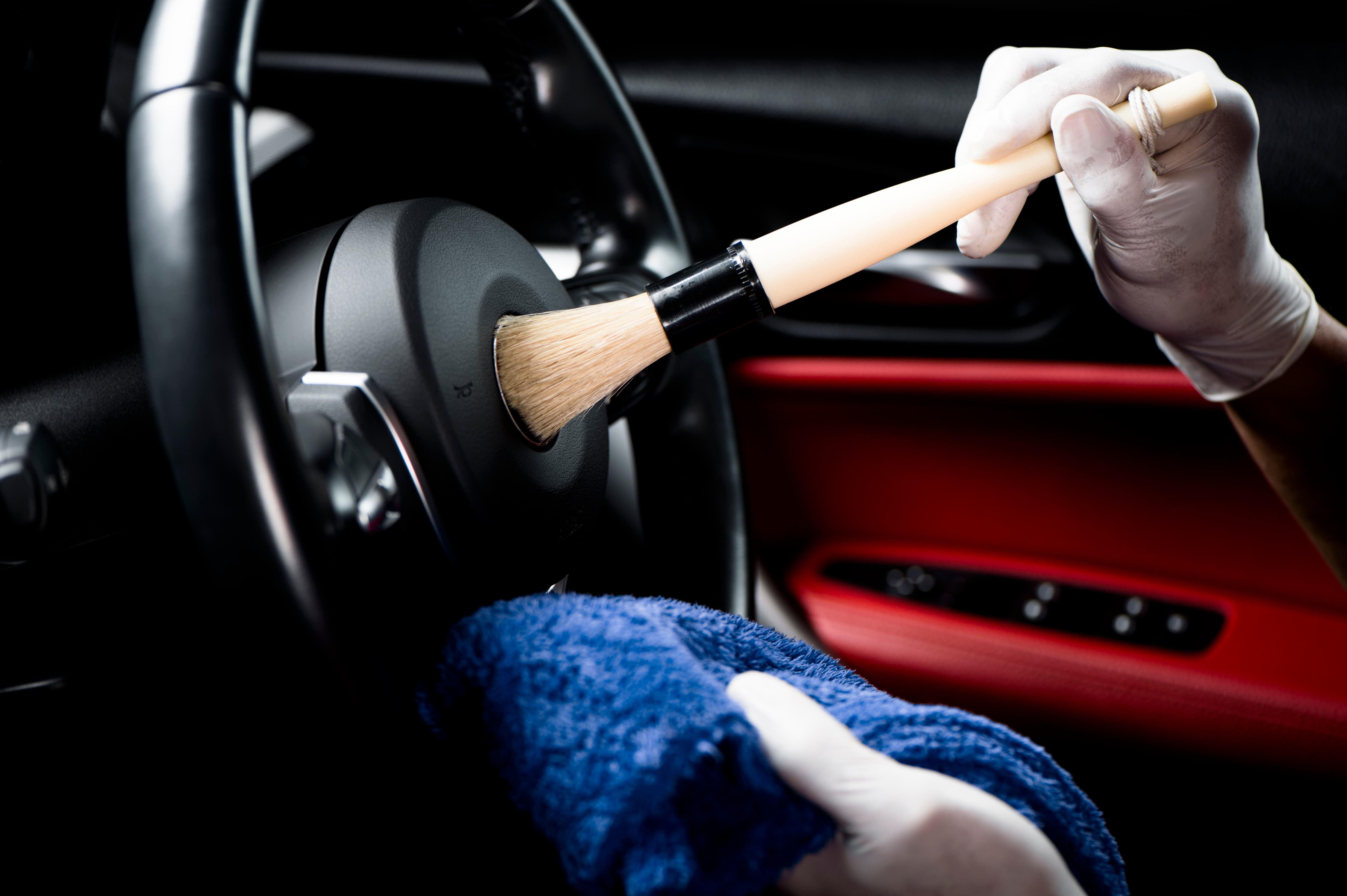 Interior of a luxury vehicle — the craft AI protects by handling the business side